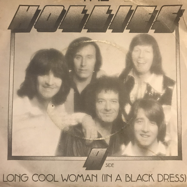 long cool woman in a black dress ccr